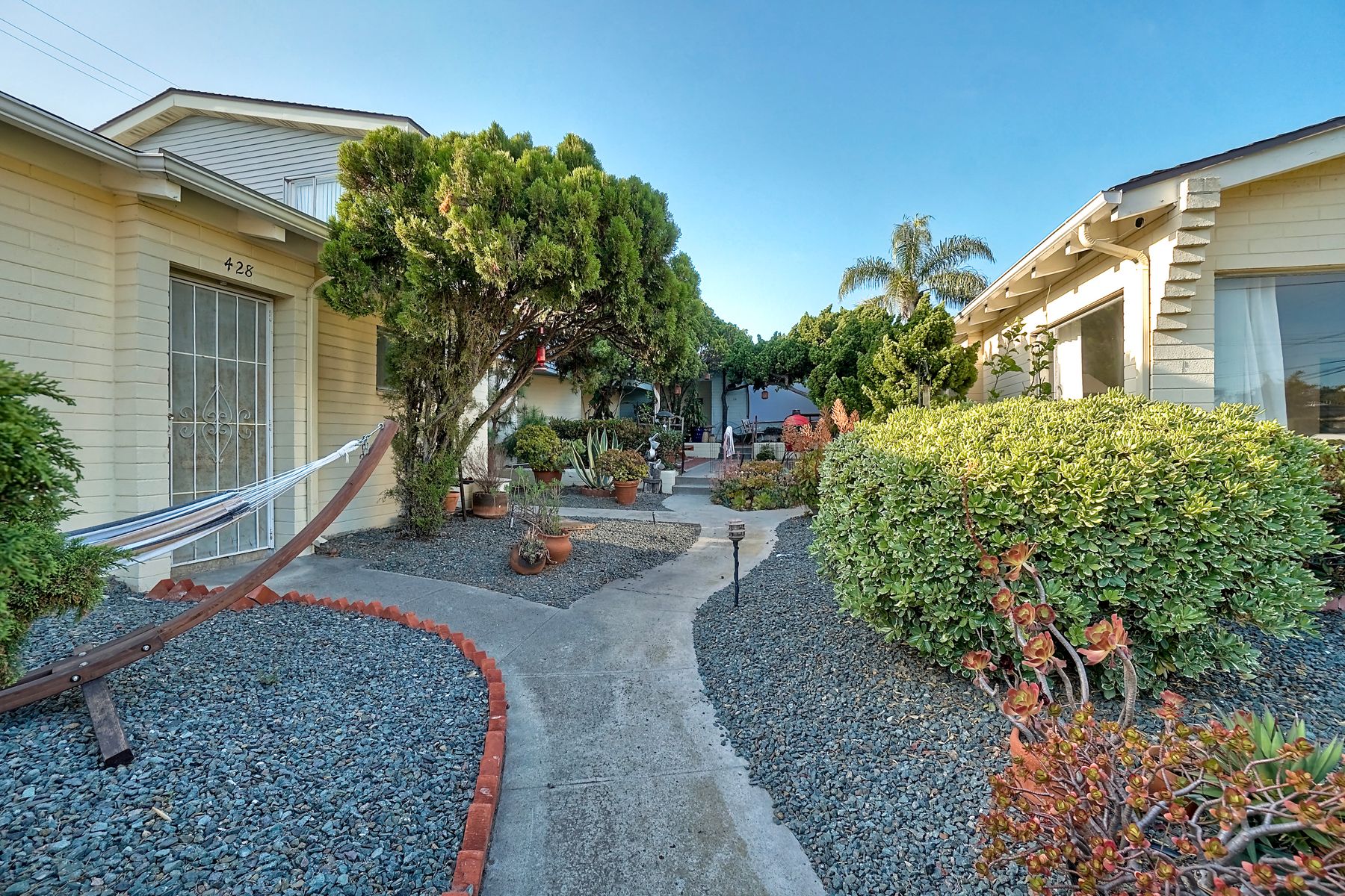 Aerial showing alley and garage block